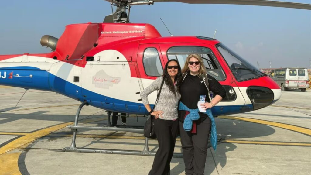 Helicopter ride offering bird’s eye view of Kedarnath Jyotirlinga Temple, snow-covered Himalayan peaks, and Garhwal village