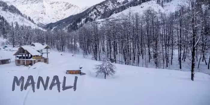 Snow-covered streets of Manali white snow with clear skies.